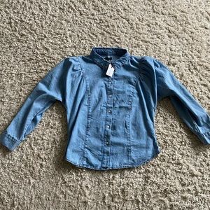 Brand new denim shirt with puff shoulders. Very trendy